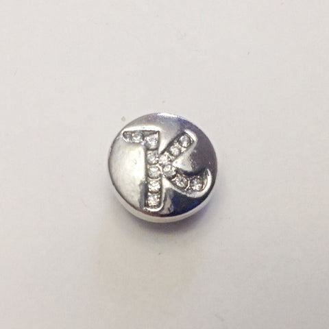 Silver coloured letter K with rhinestones 12 mm snap