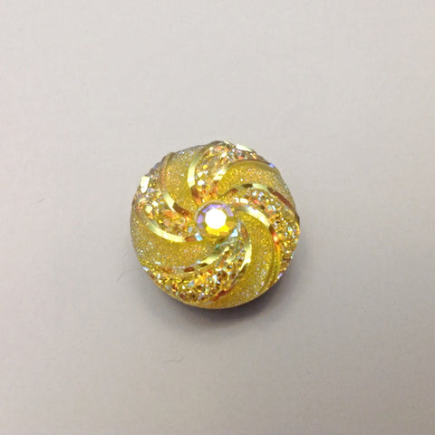 Yellow coloured kaleidoscope that changes colour with the light 18 mm snap