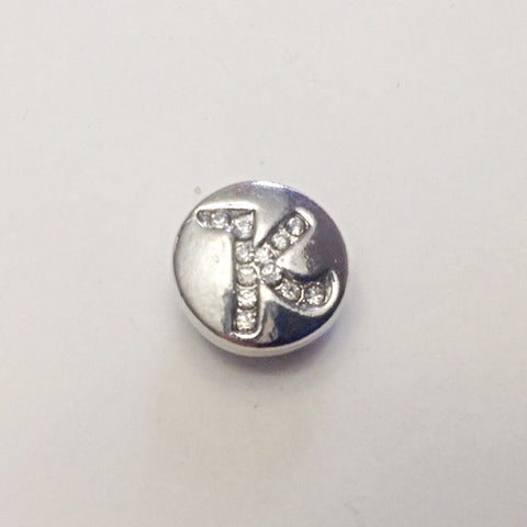 Silver coloured letter K with rhinestones 12 mm snap